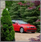 A BMW Revealed On A Stone Pavement