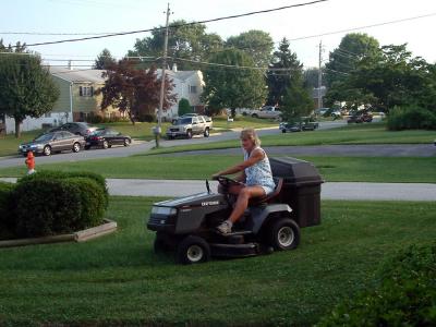 Cousin Terry cutting mom's lawn