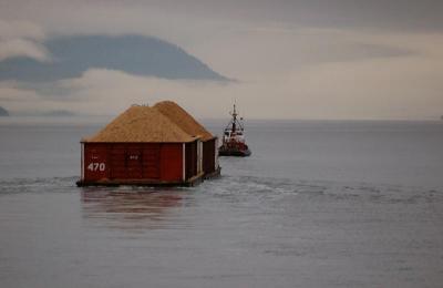 Tug and wood chip barge under tow up Howe Sound