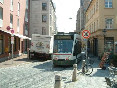 The streetcars and trucks go down these tiny little streets!