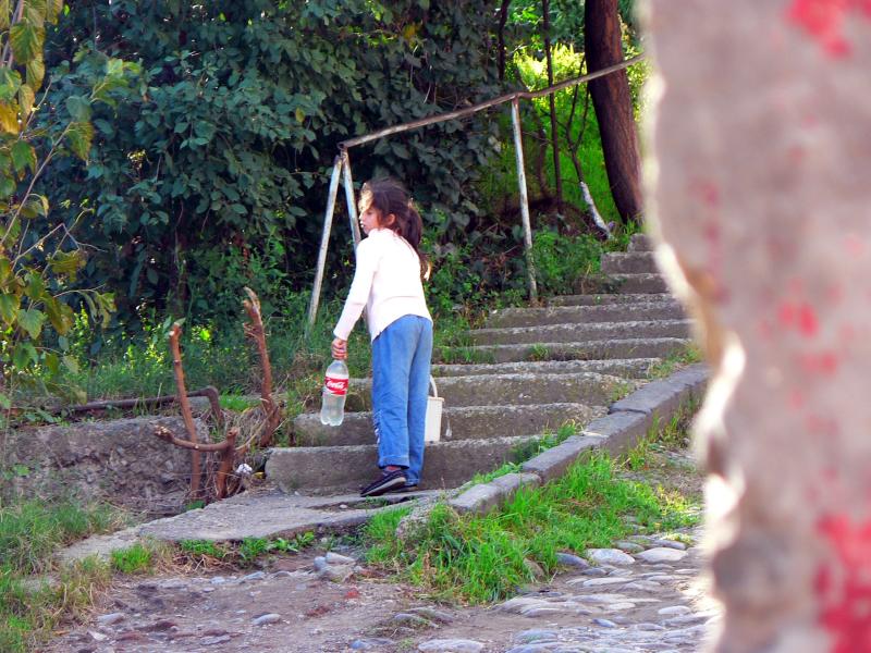 Girl carrying Water