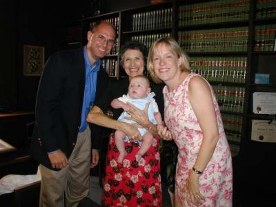 he settles down for a pose with ruth, the adoption director