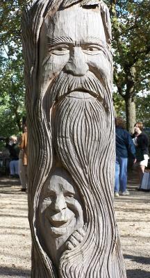2 wooden faces
