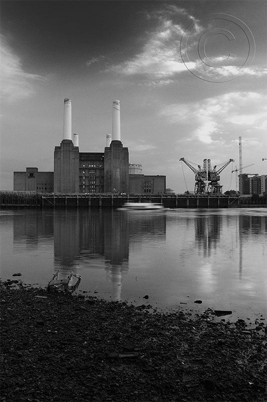 A view from the bed of the Thames at low tide of the power station
