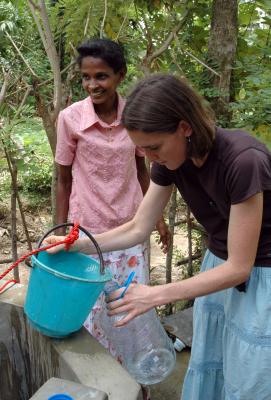 A water quality sample is taken from a drinking well