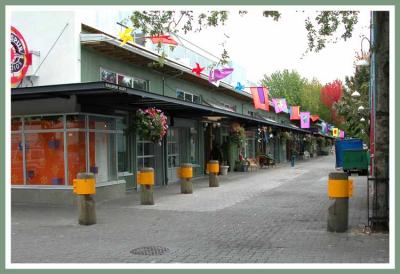 Row of shops on Granville Island, part of Vancouver waterfront.