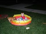 Lexi in pool with buddy