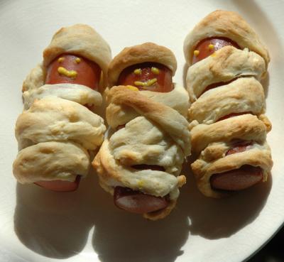 Hot dog mummies for a halloween party.