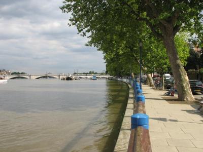 Embankment looking towards bridge at high tide.