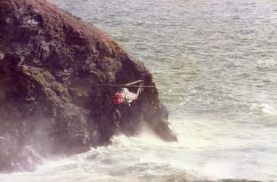 Searching for a body reported in the sea.