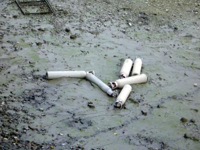 More rubbish (gas cylinders) dumped in the river.