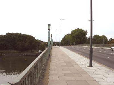 Walking across bridge towards Middlesex.