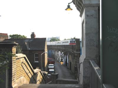 Tube train approaching bridge.