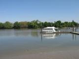 Riverside Quarter moorings. Hurlingham Park is on the other side of the river.