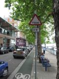 Flood warning sign. Embankment. Star and Garter to left.