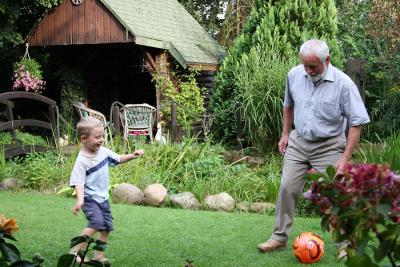 Herman playing soccer with Max