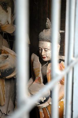 Sad and heartbroken Budda in the jail