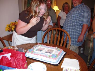 Sarah blowing out candles