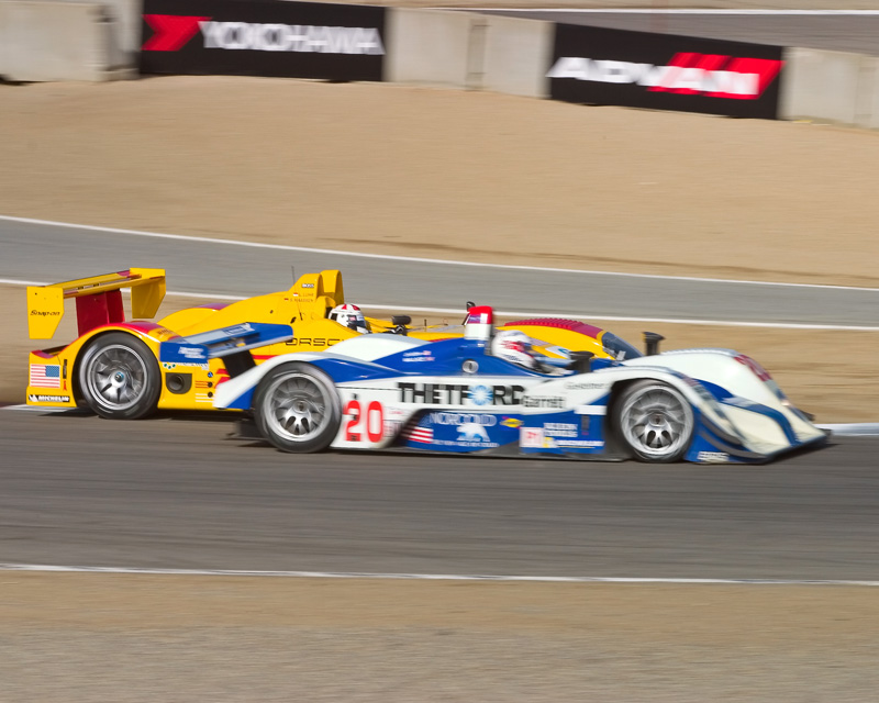 Porsche RS Spyder trying to get under the Dyson Lola in turn 2