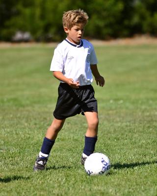 Dylan dribbling down the field