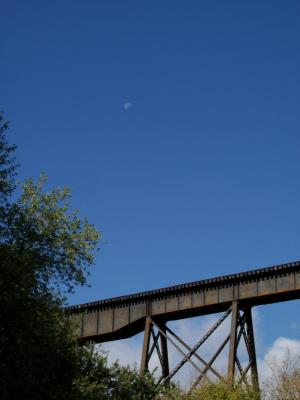 Midmorning moon over railroad bridge at Shepherdstown