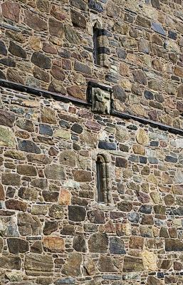 Obscene carving, intended to distract evil spirits bent on entering the church.