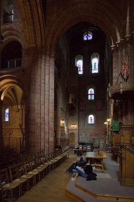 Art students sketching in the flag draped nave of St. Magnus Cathedral.