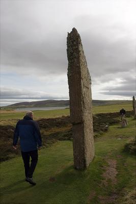 One of the taller stones in the Ring of Brodgar (man is roughly 6 feet tall).