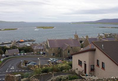 Stromness harbour with Scapa Flow on the horizon.