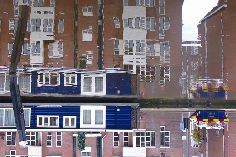 Blue houseboat reflection