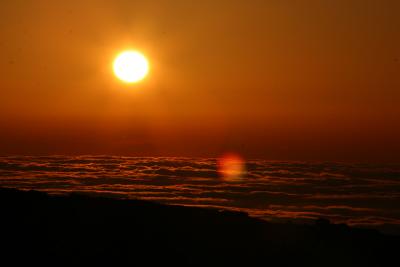 Sunset over the sea of clouds