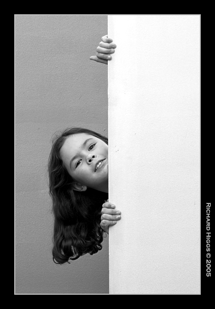 Behind the white wall