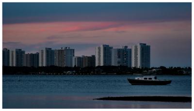 river and oceanside condos at dusk