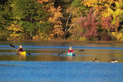 A Mother and Her Daughter in Kayaks on Shepherd Lake