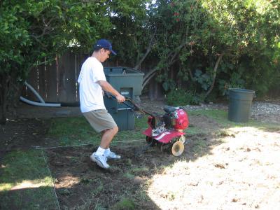 Rototilling to break up sod as well as hard ground underneath.