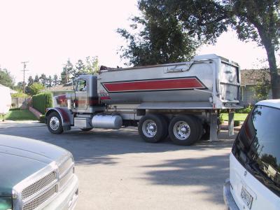 Truck with wood chips arrives