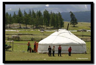 A Kazakh Family Gathering Outside their Ger, Altai Tavanbogd National Park