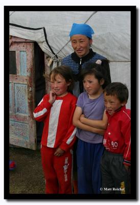Mother with her Children outside their Ger, Altai Tavanbogd National Park