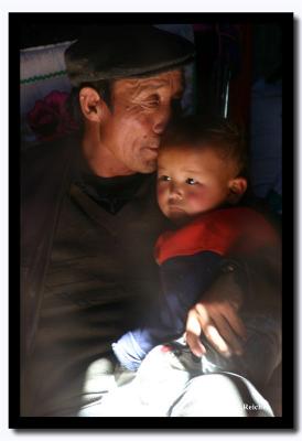 Grandfather kisses his Grandson, Bayan-Olgii Aimag