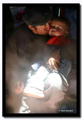 Grandfather kisses his Grandson, Bayan-Olgii Aimag