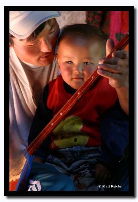 Father with Son Playing the Dombra, Bayan-Olgii Aimag