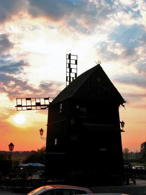 Sunset With A Windmill