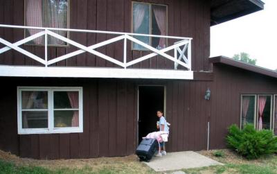 -60400 Lily Entering Horseshoe Cabin