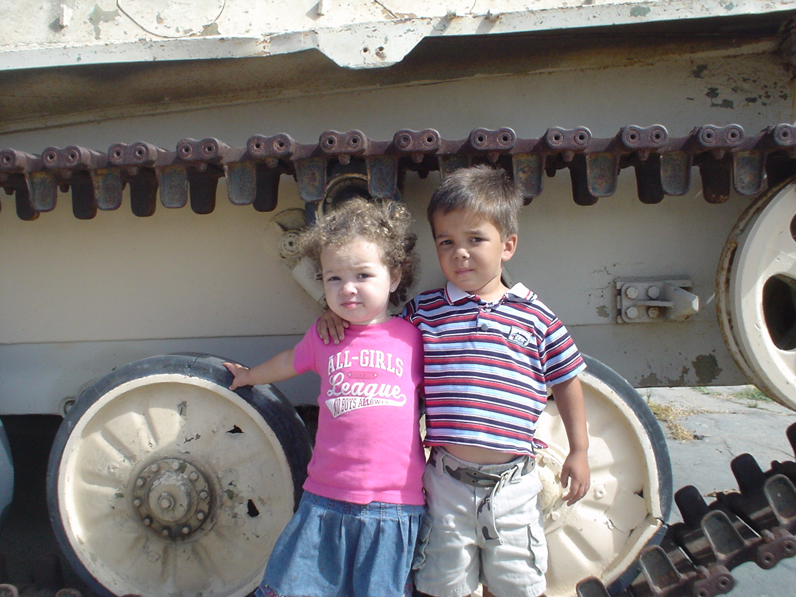 At one of the captured tanks on display