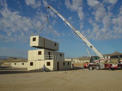 The front loader could not lift high enough for the 3-story houses