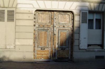 Paris waking up, sunrise on a door