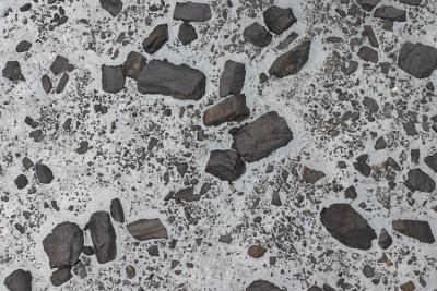 Alternative artform to mudcracks: rocks embedded in glacier ice