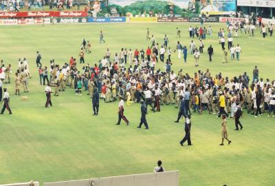 Crowd invades the field after West Indies Victory