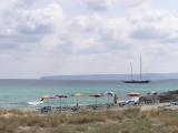 Loungers piled at Levant - La Mola on the horizon