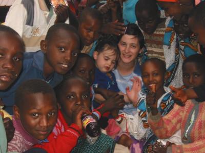 Niamh and Tegan among the children